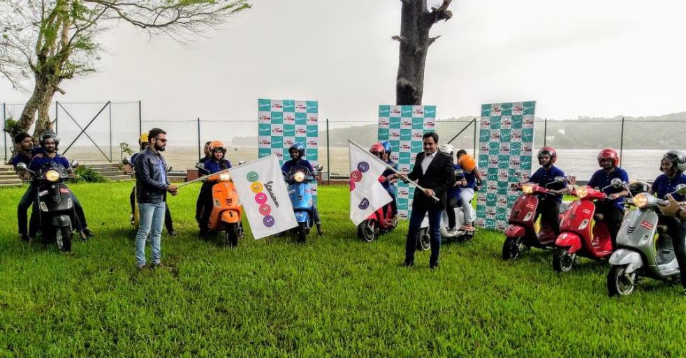Ashish Yakhmi (right) flagging off Vespa Tours at Goa