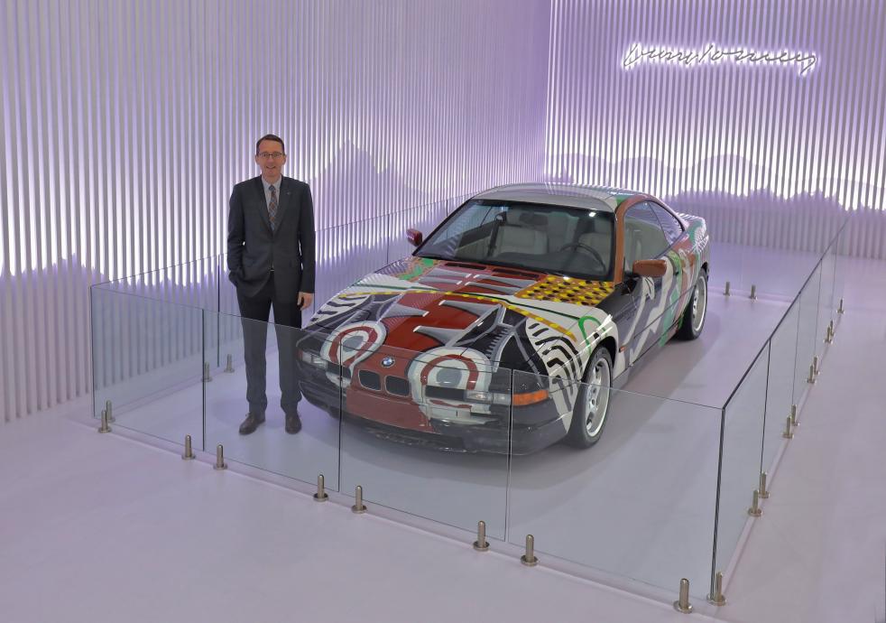01 image dr. hans christian baertels, president (act), bmw group india with the 14th bmw art car by david hockney