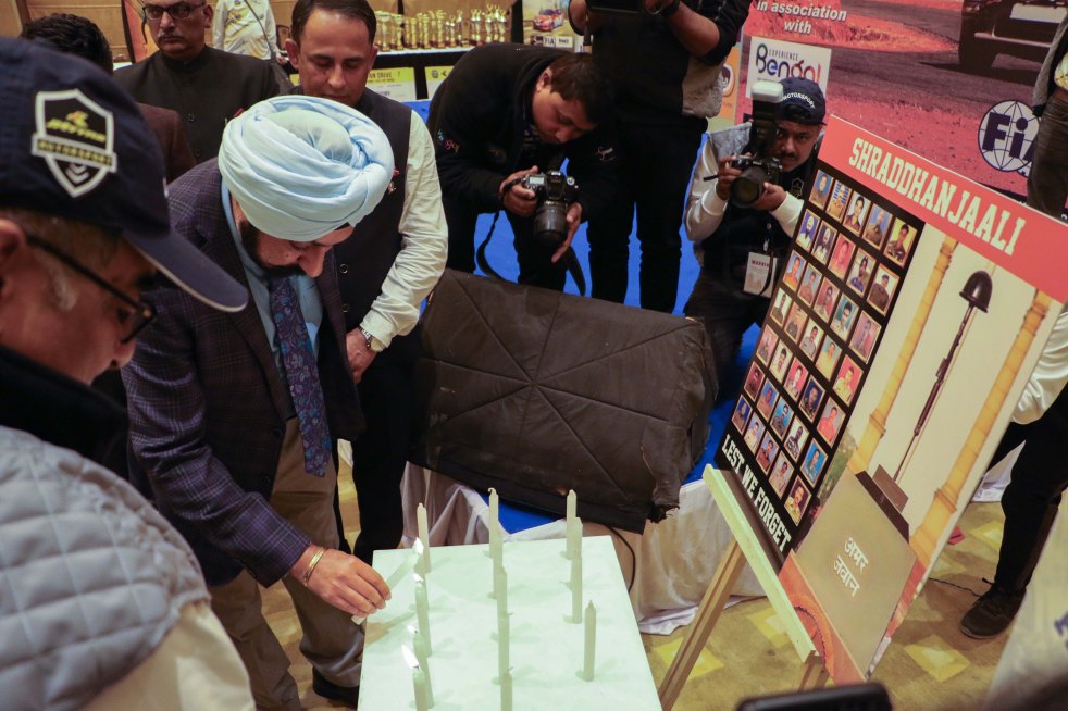 Colonel Jagdeep Singh lighting the candles infront of the photographs of the fallen CRPF soldiers