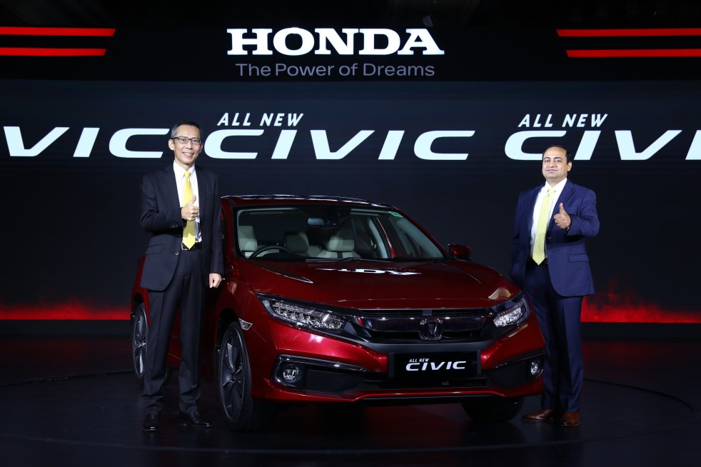 Mr. Gaku Nakanishi, President &amp; CEO and Mr. Rajesh Goel, Sr Vice President &amp; Director Honda Cars India at the launch of All-New 10th Generation Honda Civic in India